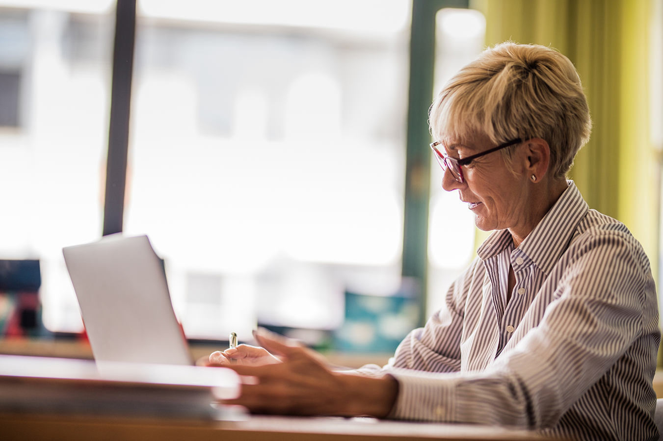 A supervisor reviews her observations and notes during the placement.