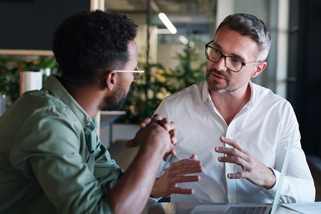 Two men are having a conversation.